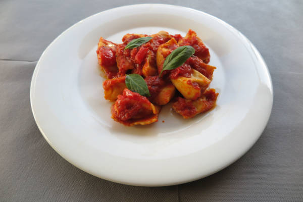 Handmade Ravioli stuffed with Ricotta, Tomato Cherry and Basil Sauce