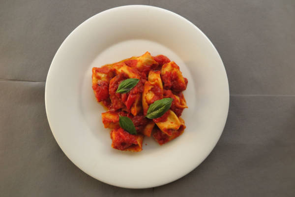 Handmade Ravioli stuffed with Ricotta, Tomato Cherry and Basil Sauce